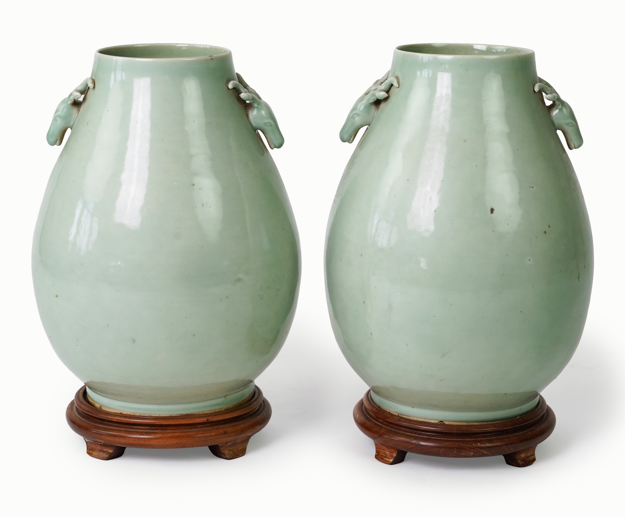 A pair of large Chinese celadon glazed ‘ hu’ vases, Yongzheng seal mark, 19th century